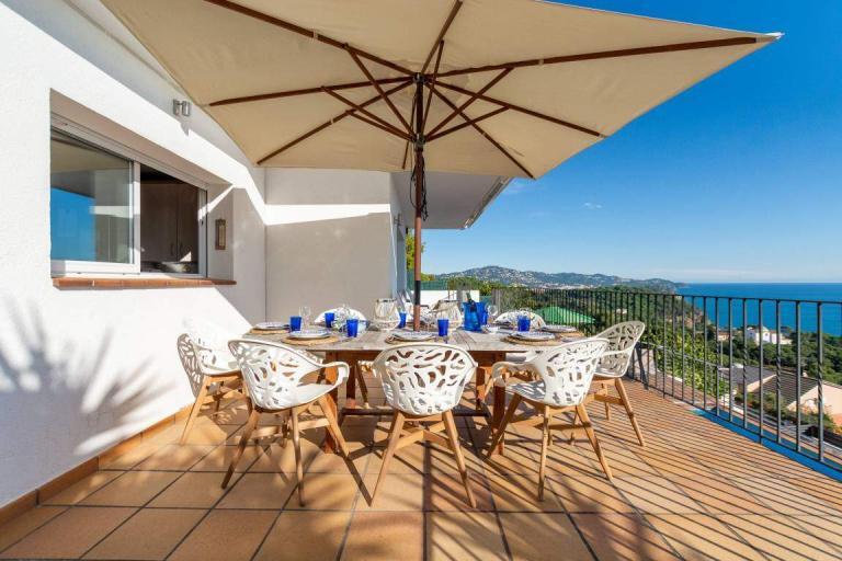 A Table And Chairs On A Patio