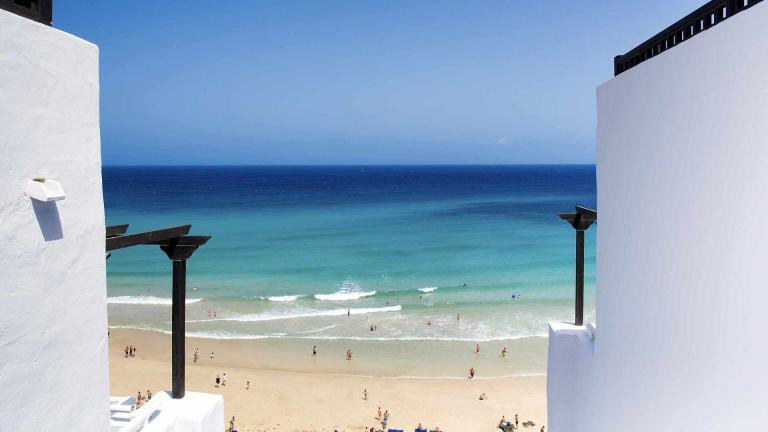 A View Of A Beach From A Balcony