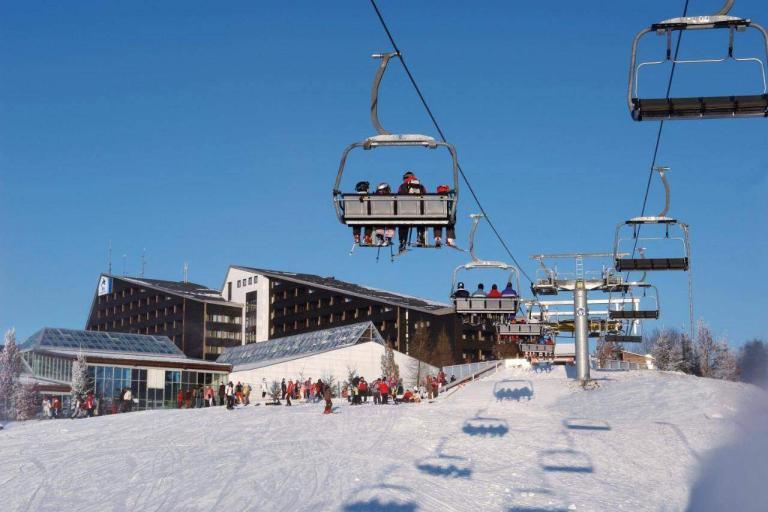 A Ski Lift With People On It