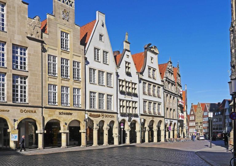 A Row Of Buildings In A City