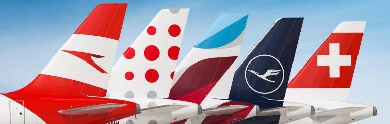 Tail Fin Of Airplanes With Different Colors Of Patterns